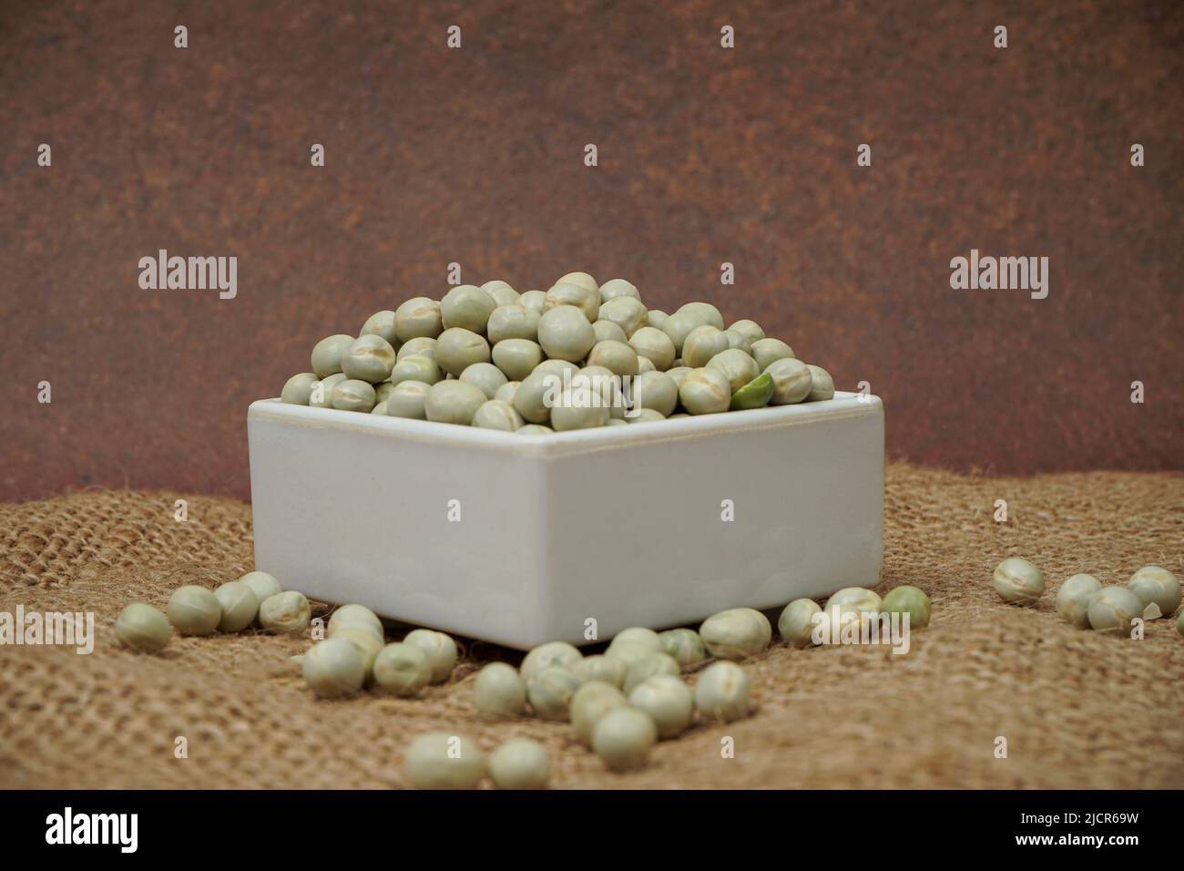 Uncooked dried green peas, also known as vatane in Marathi. in a