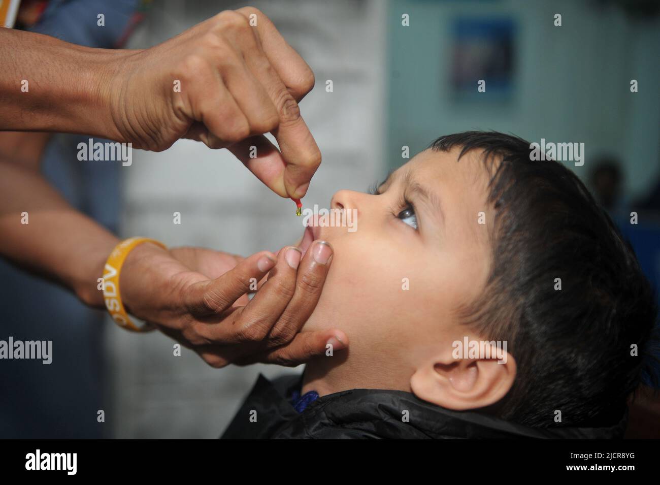 Sylhet, Bangladesh. 15th June 2022. Health care workers giving children