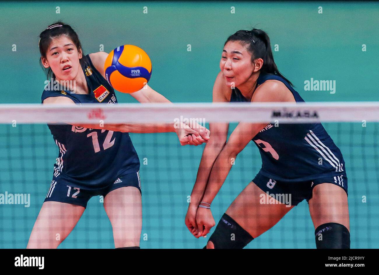 Quezon City. 15th June, 2022. Li Yingying (L) and Jin Ye of China compete during the FIVB