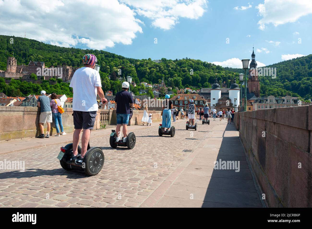 Segway tour on the Old Bridge in Heidelberg, Germany Stock Photo