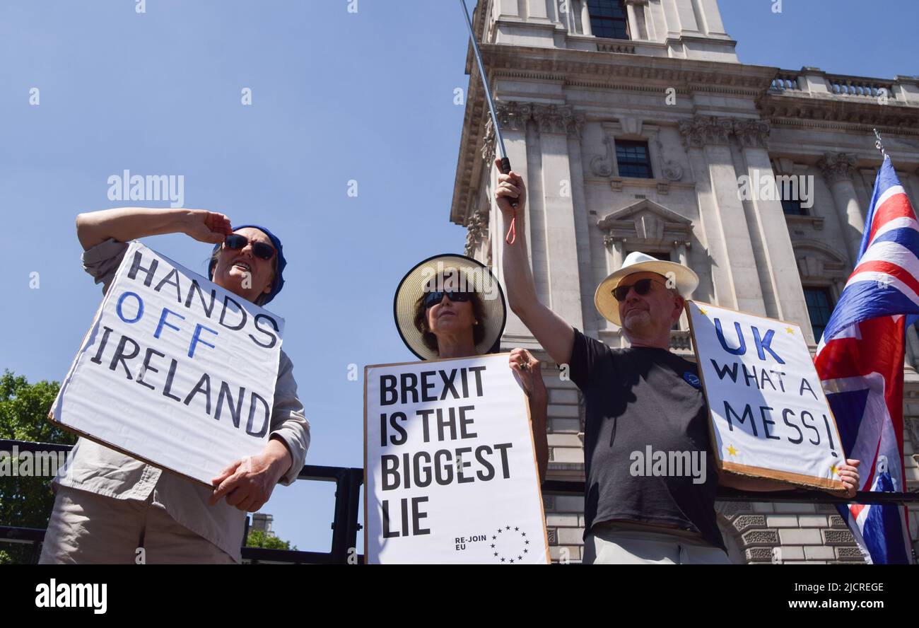 London, England, UK. 15th June, 2022. Protesters hold pro-Northern Ireland Protocol and anti-Brexit placards. Demonstrators gathered in Parliament Square in support of the Northern Ireland Protocol, and in protest against Brexit and the Tory Government. (Credit Image: © Vuk Valcic/ZUMA Press Wire) Stock Photo