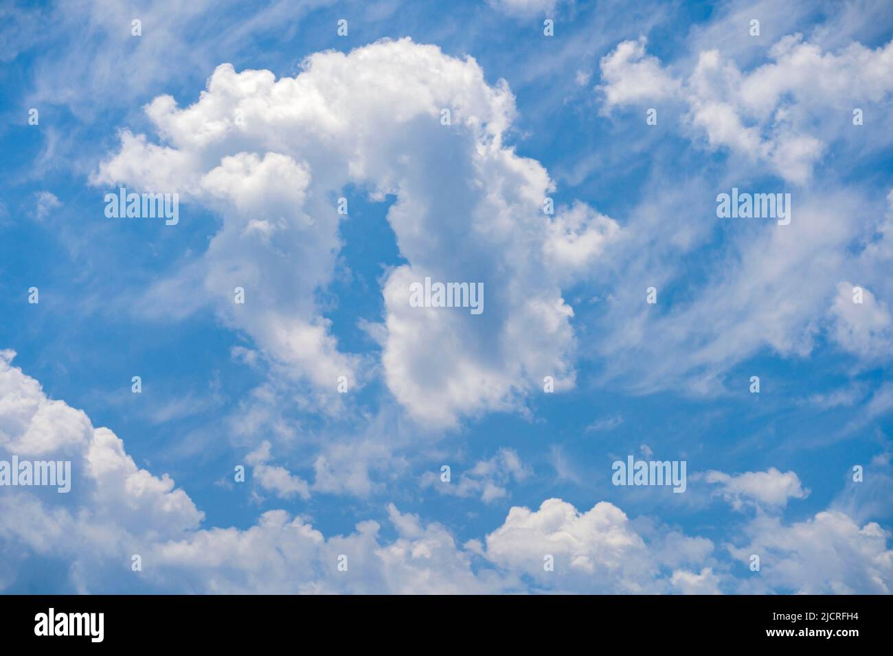 Beautiful vivid blue sky with summer clouds background Stock Photo