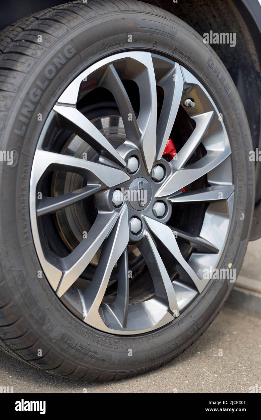 Russia, Izhevsk - August 14, 2020: Geely showroom. The wheel of new CoolRay car. Alloy wheel and LingLong tyre. Famous world brand. Modern transport Stock Photo