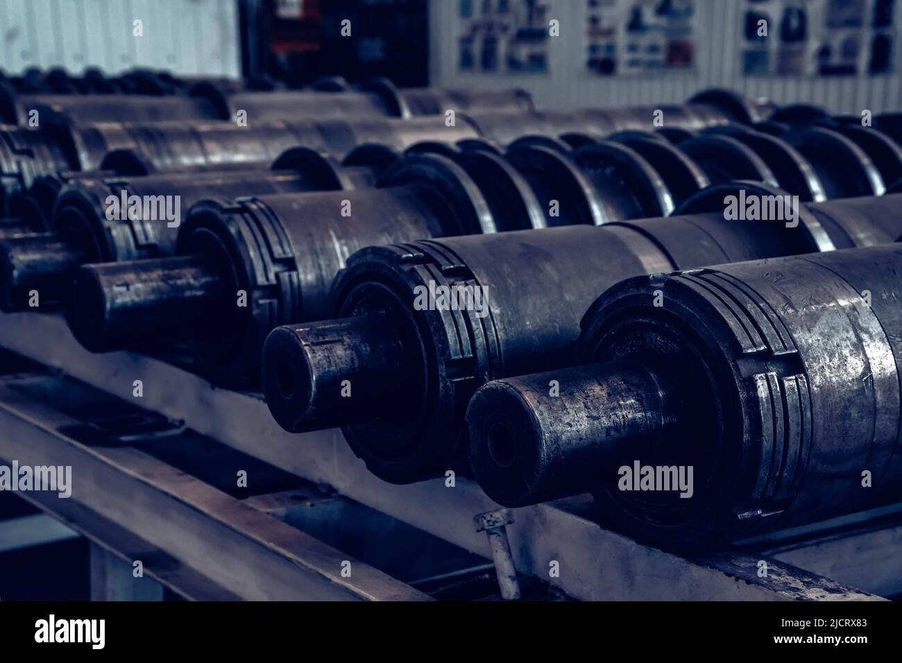 Close up steel axle shafts in factory. Industrial concept Stock Photo ...