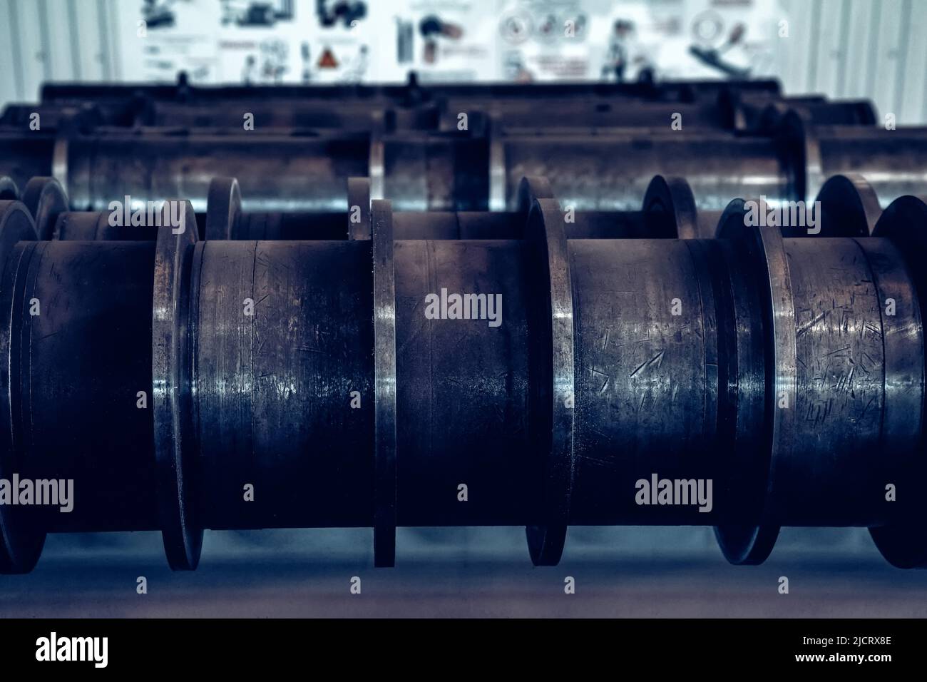 Close up steel axle shafts in factory. Industrial concept Stock Photo ...