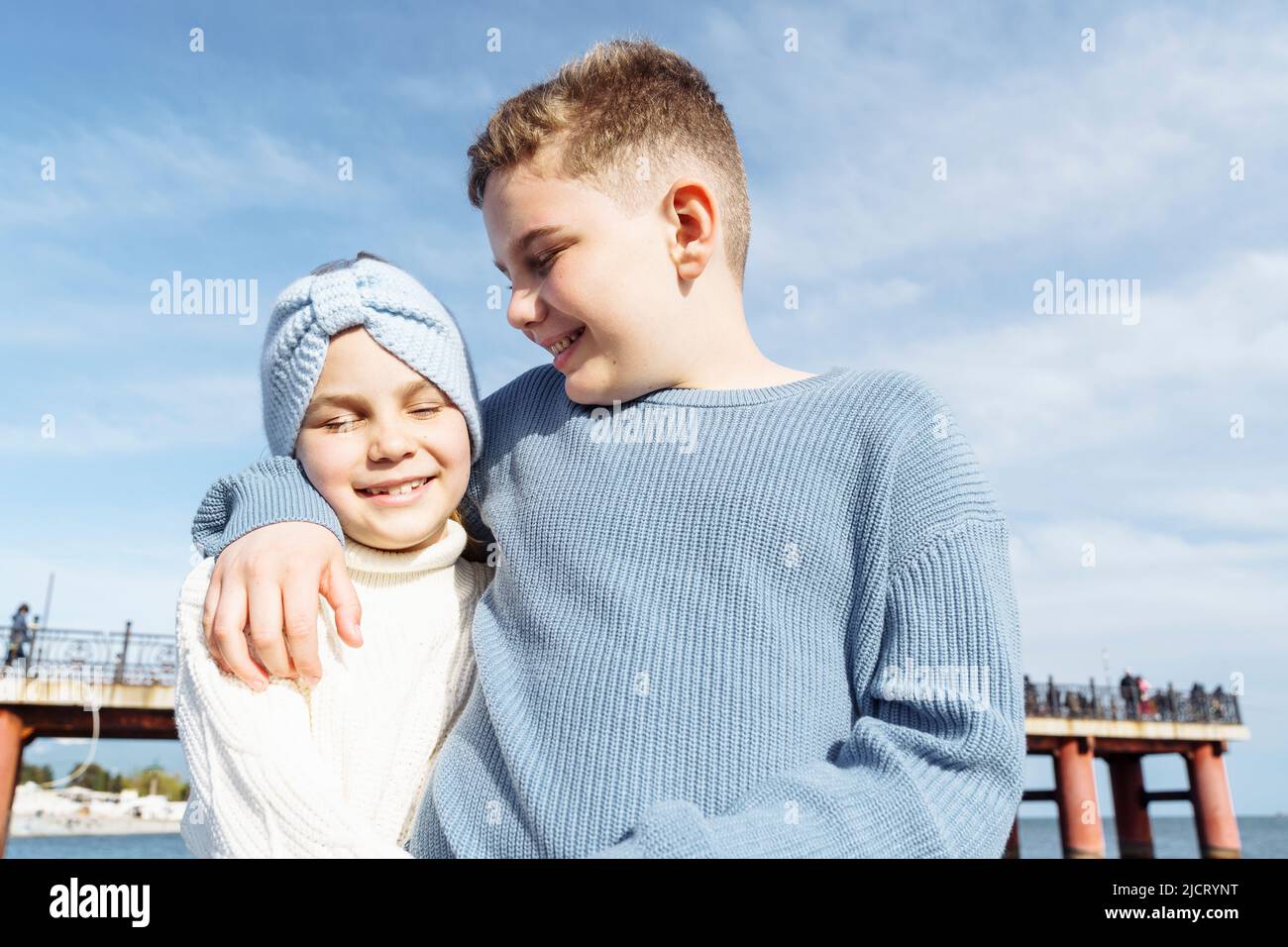 Portrait of a happy hugging brother and sister. Stock Photo
