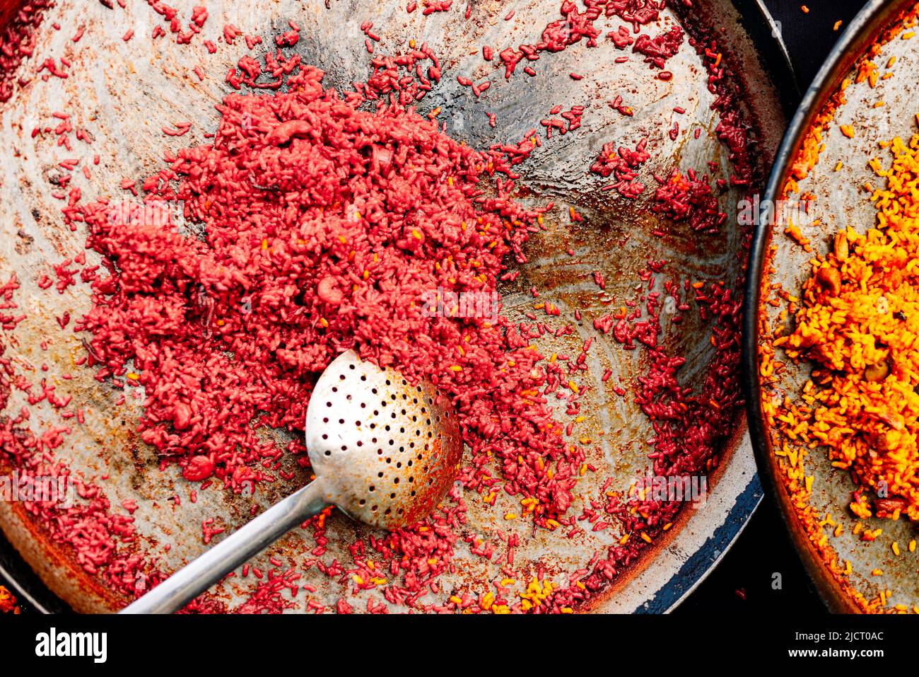 Paella is a traditional Spanish dish, with varieties of preparations, all with rice. Stock Photo