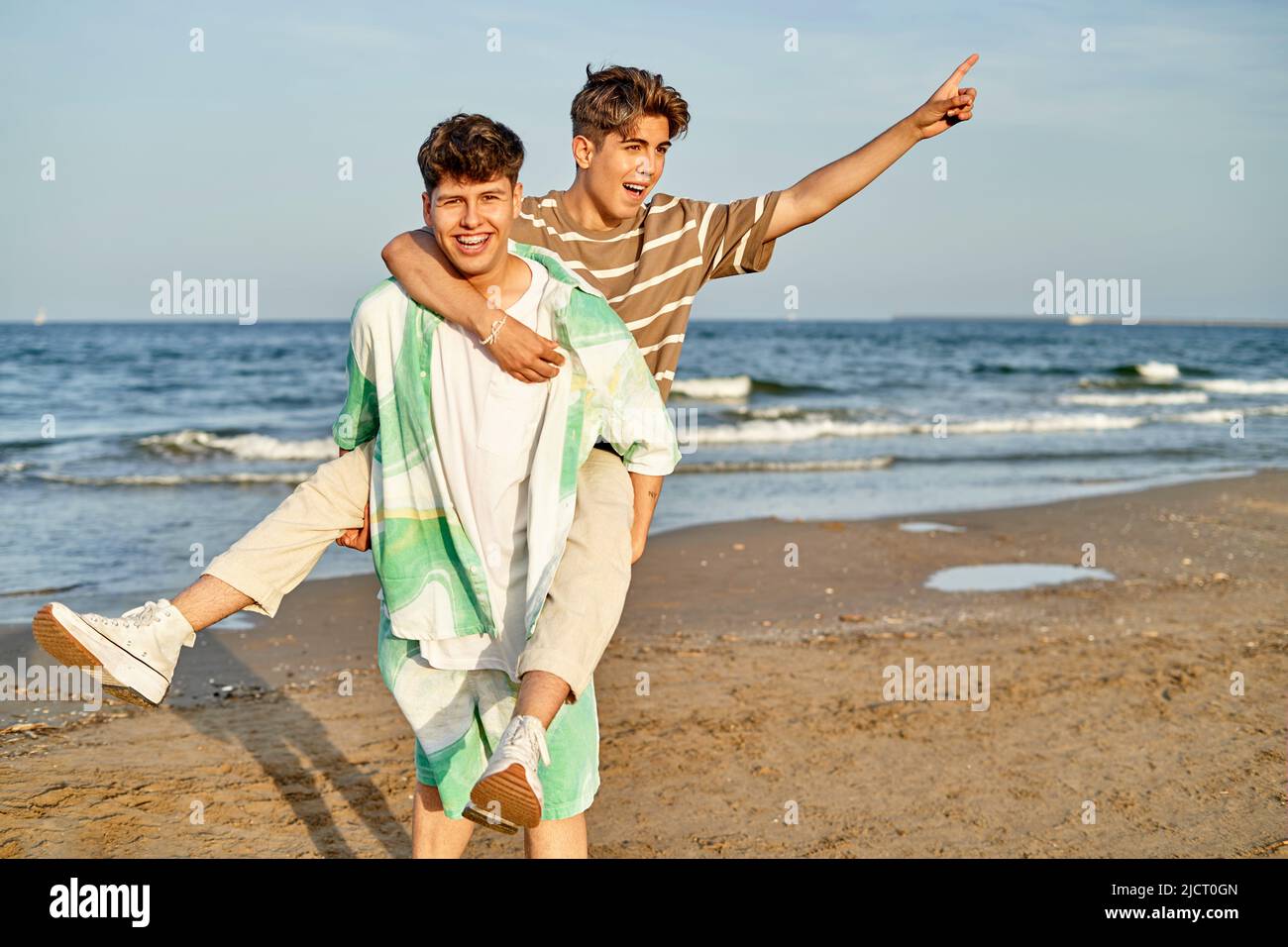 Couple Having Fun In The Beach Stock Photo