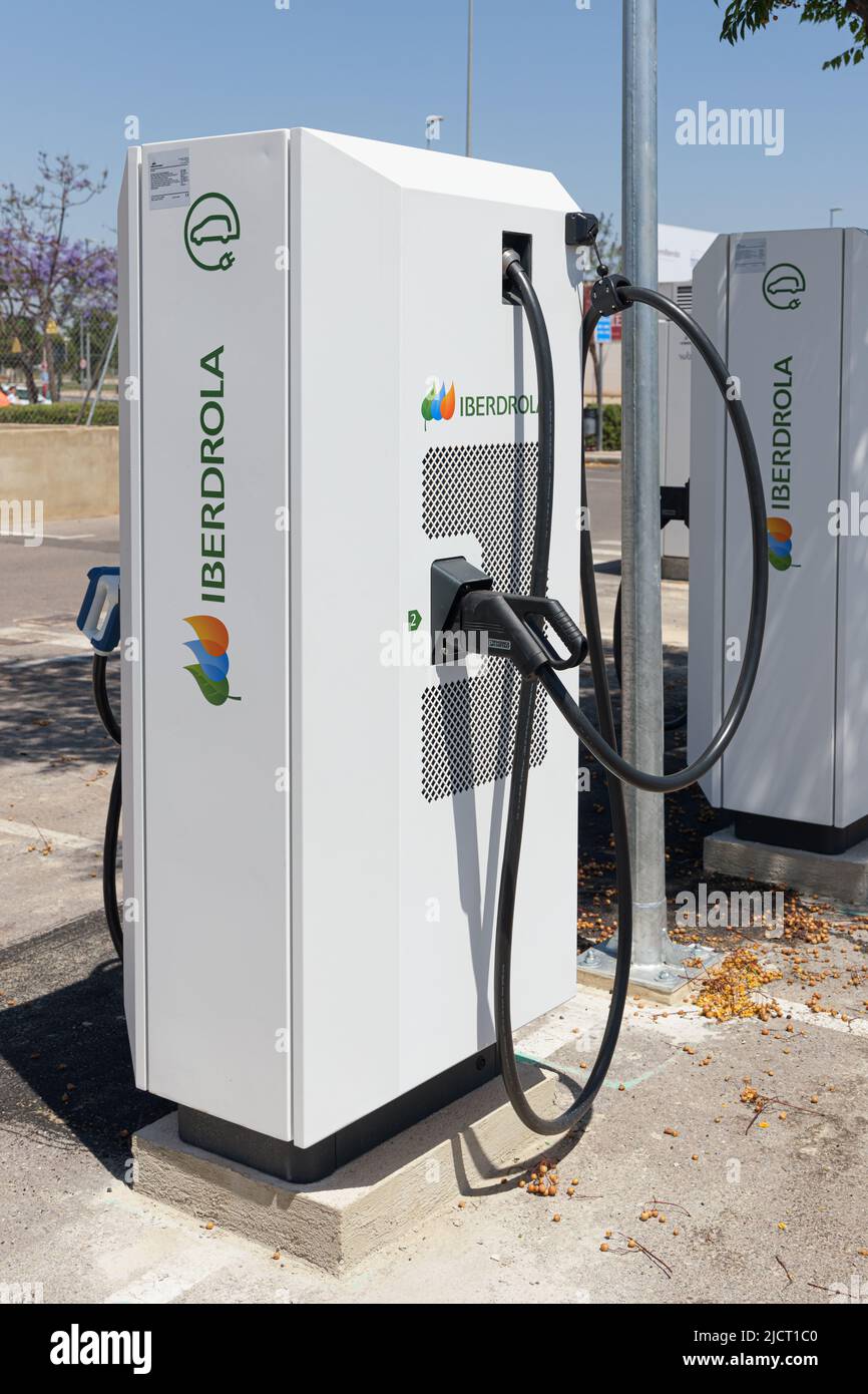 ALFAFAR, SPAIN - JUNE 06, 2022: Electric car charging station powered by Iberdrola Stock Photo