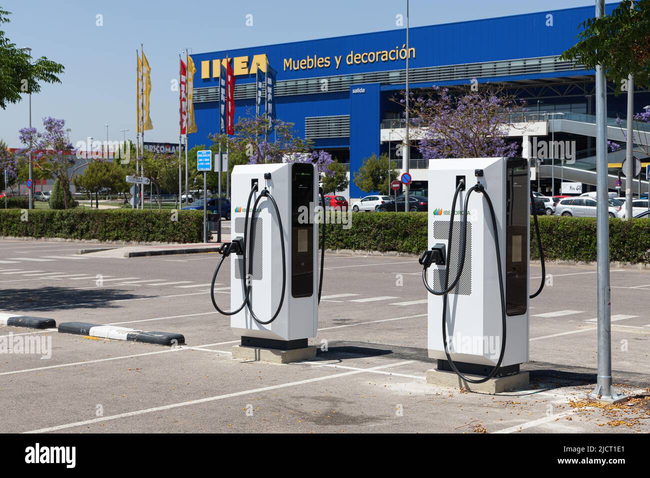 ALFAFAR, SPAIN - JUNE 06, 2022: Electric car charging station powered by Iberdrola near Ikea store Stock Photo