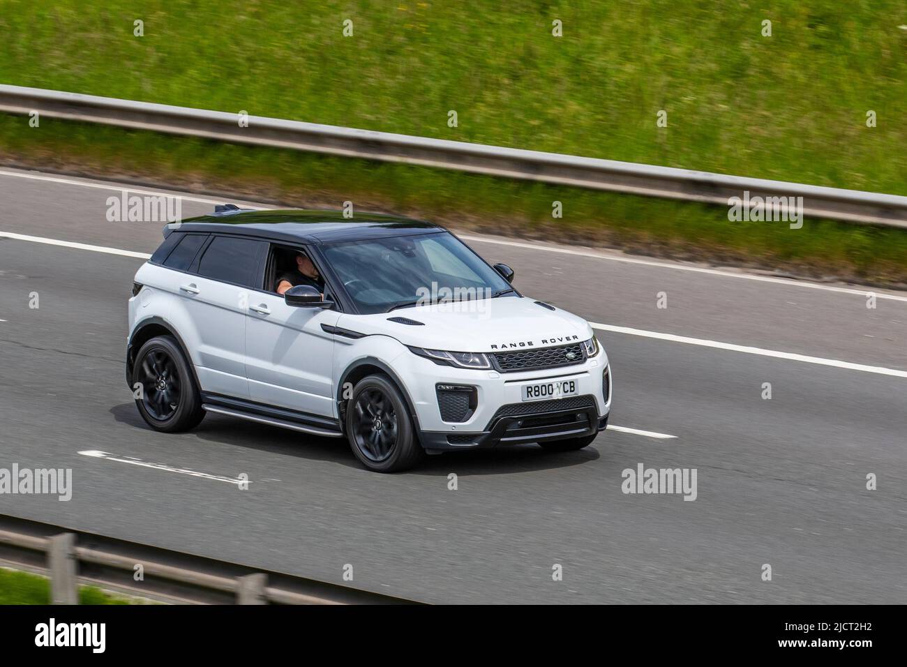 2018 white Range Rover Evoque TD4 SE Tech Diesel 9 speed automatic; driving on the M6 Motorway, UK Stock Photo