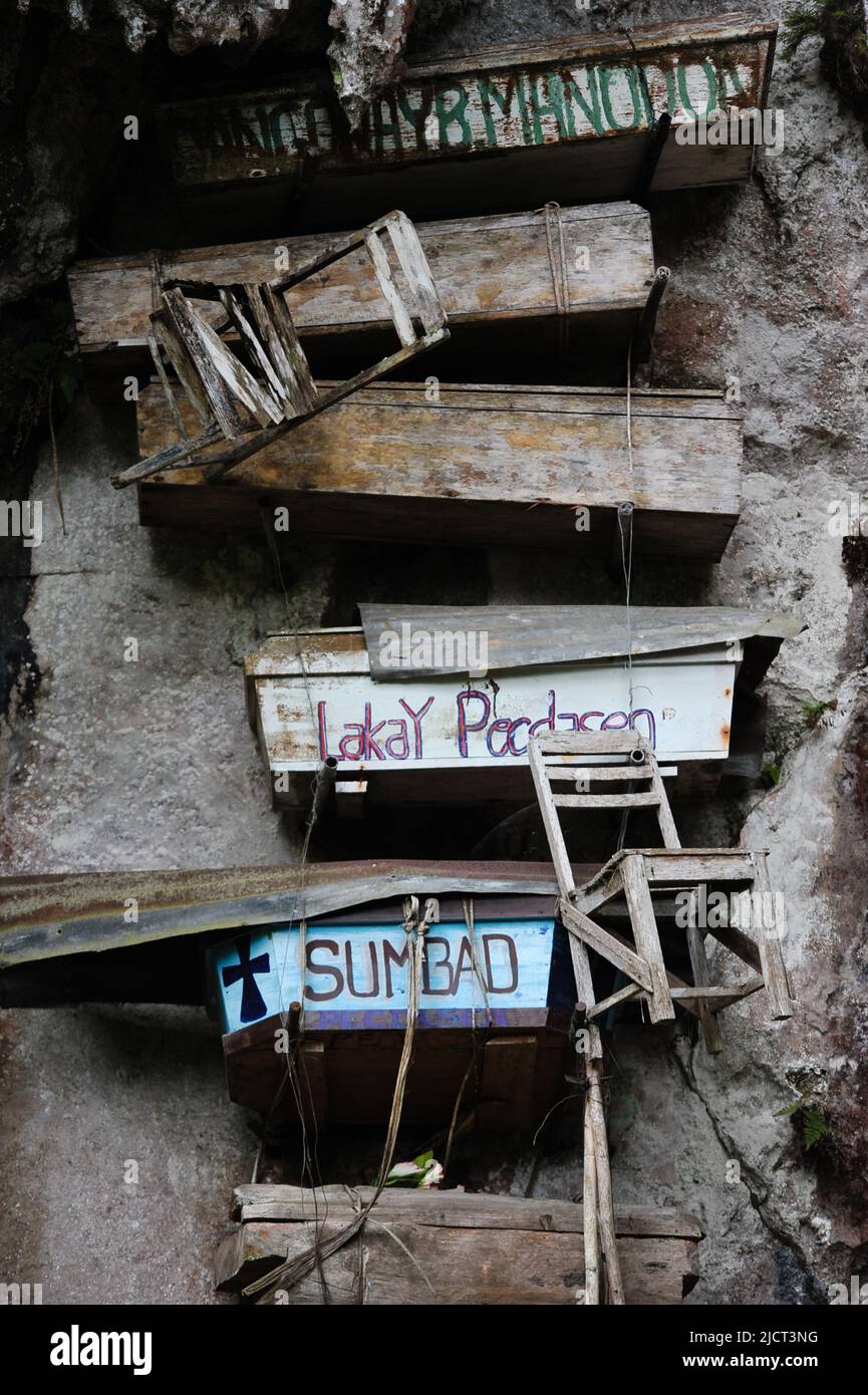 Mountain Province, Philippines: Sagada Hanging Coffins with wooden 'death chairs', where the deceased was displayed in their home prior to burial. Stock Photo
