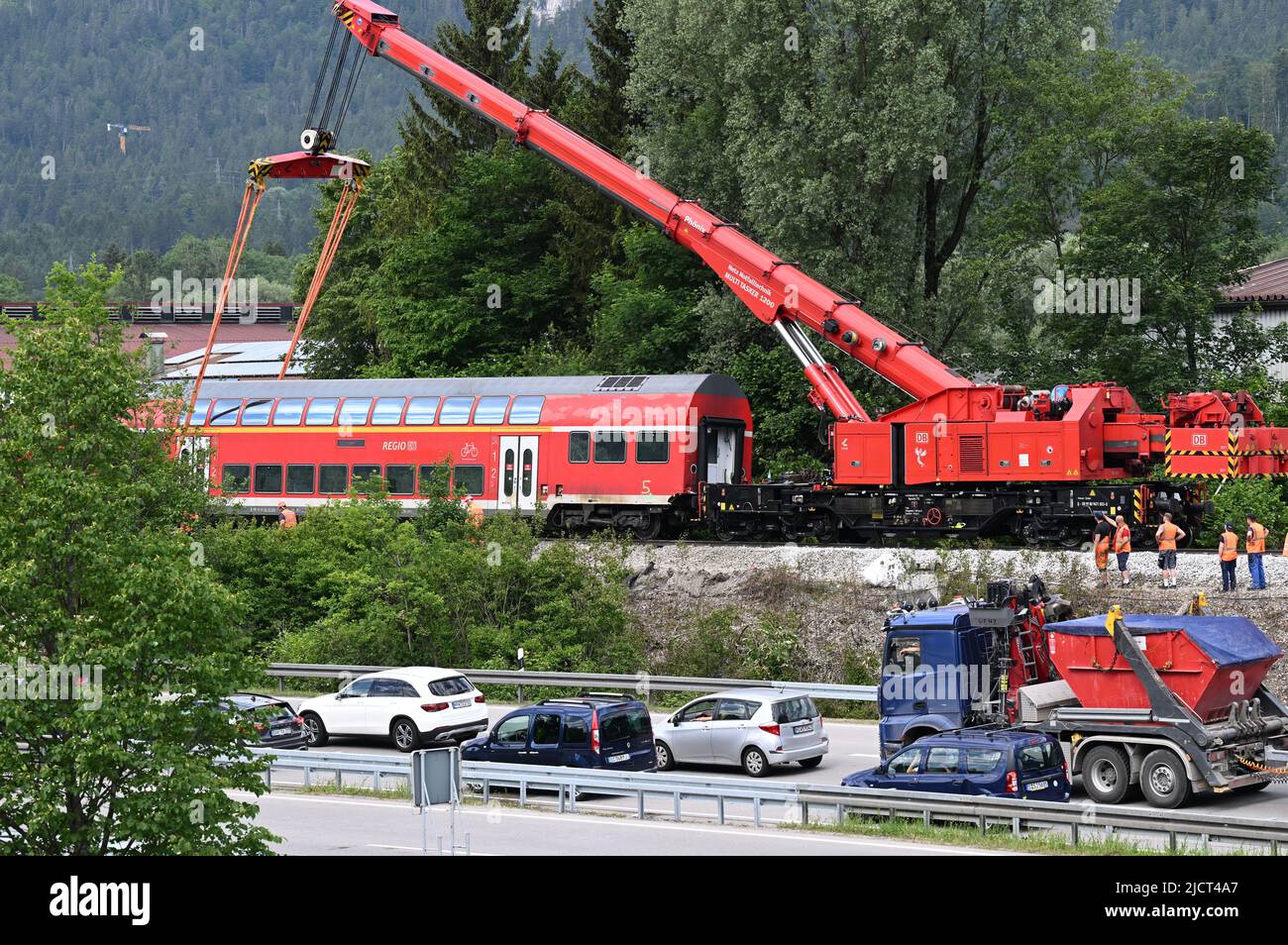 Garmisch Partenkirchen, Germany. 15th June, 2022. A wagon is suspended from the rail crane for recovery. Credit: Angelika Warmuth/dpa/Alamy Live News Stock Photo