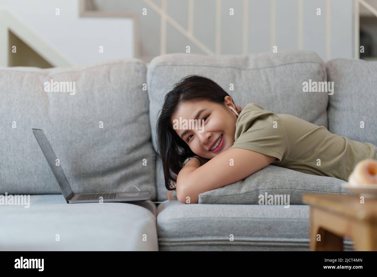 Woman relax couch indoor mature hi-res stock photography and images - Alamy