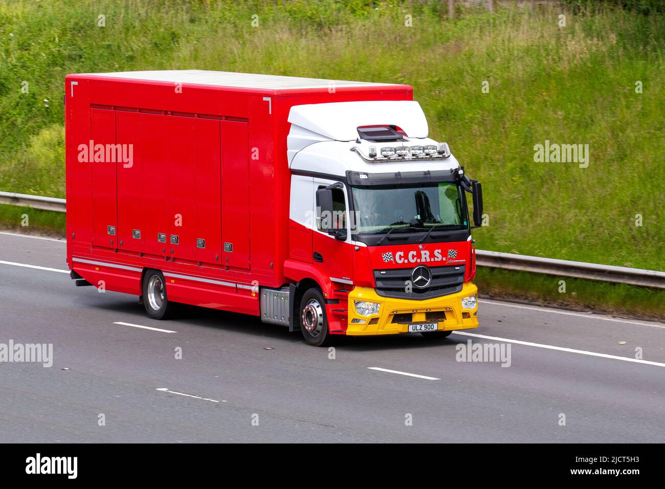 C.C.R.S 2019 Mercedes Benz 1824L 7698cc automatic C.C.R.S. Rescue & Recovery recovery operators based in Northern Ireland; driving on the M6 Motorway, UK Stock Photo