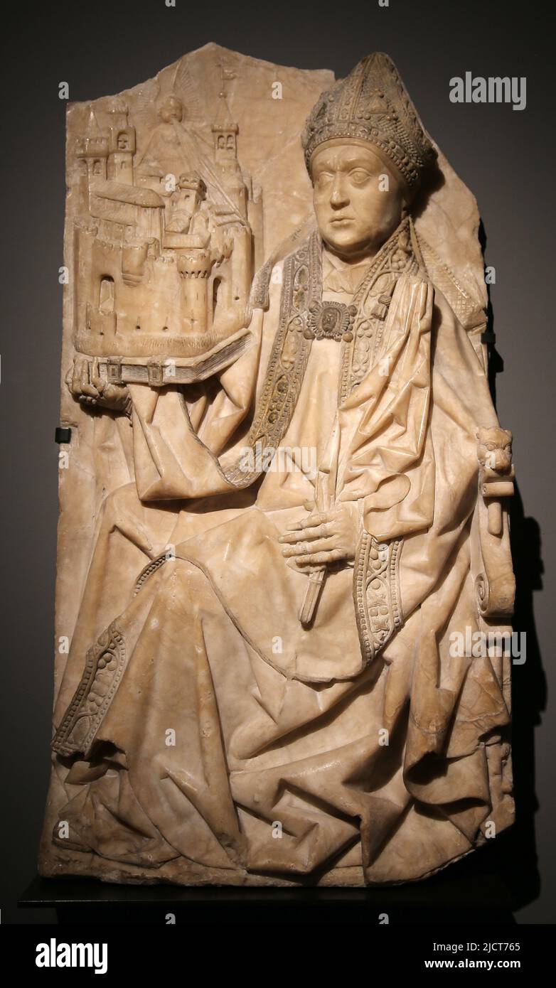 St Augustine holding the Hippo Regius city . Burgos , Spain. c. 1500. Alabaster,polychromy. Rijksmuseum. Amsterdam. Netherlands. Stock Photo