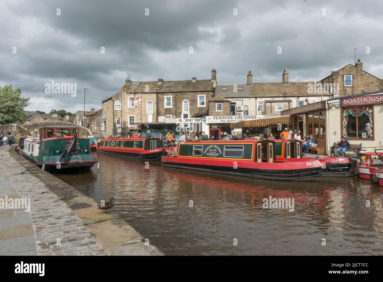 General view of boats (Pennine Cruisers) on the Leeds and Liverpool Canal in the market town of Skipton, North Yorkshire, UK. Stock Photo