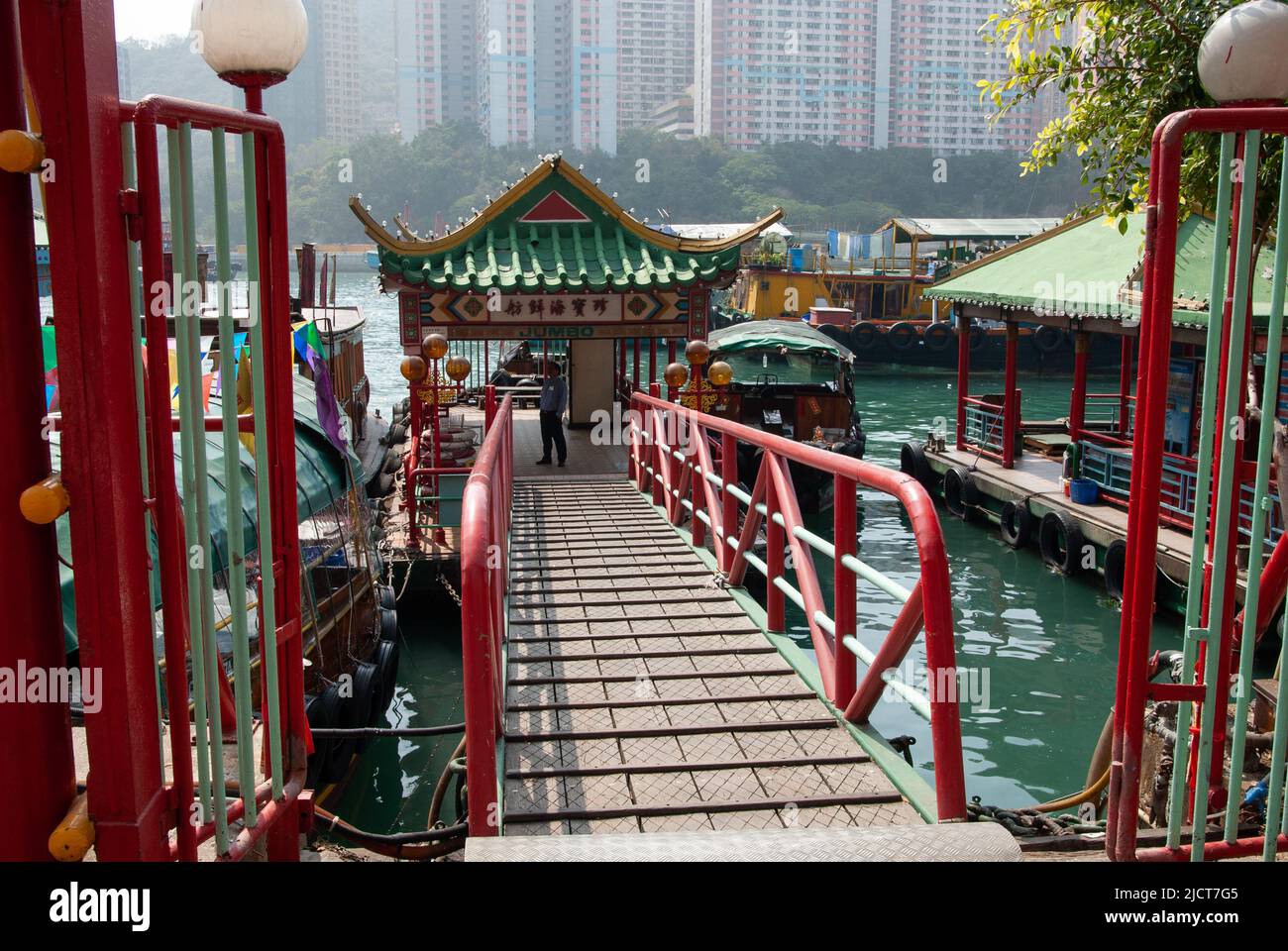 Jetty for the Jumbo floating restaurant in Aberdeen harbour in Hong Kong to take customer to the restaurant from the mainland. Stock Photo