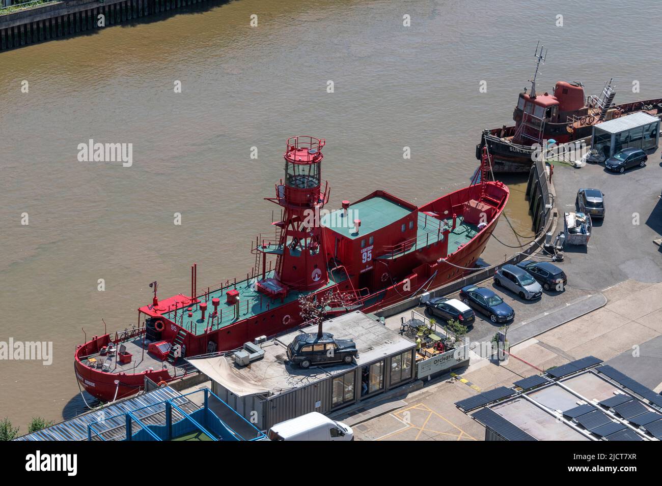 Aerial View of the Lightship and Tug Boat at Trinity Buoy Wharf, London E14. Stock Photo