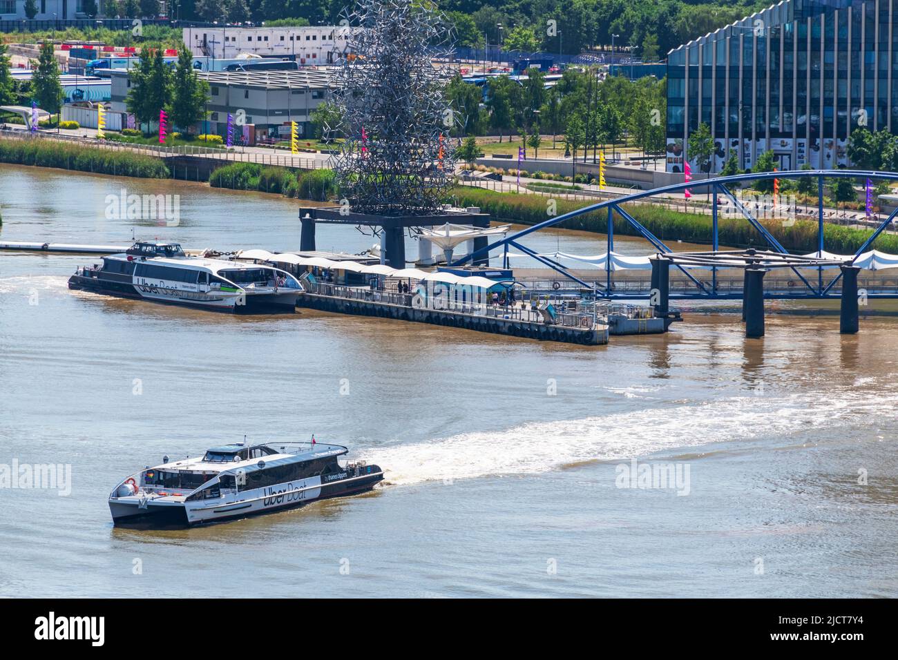 An Uber River Bus leaves North Greenwich Pier in South East London. Stock Photo