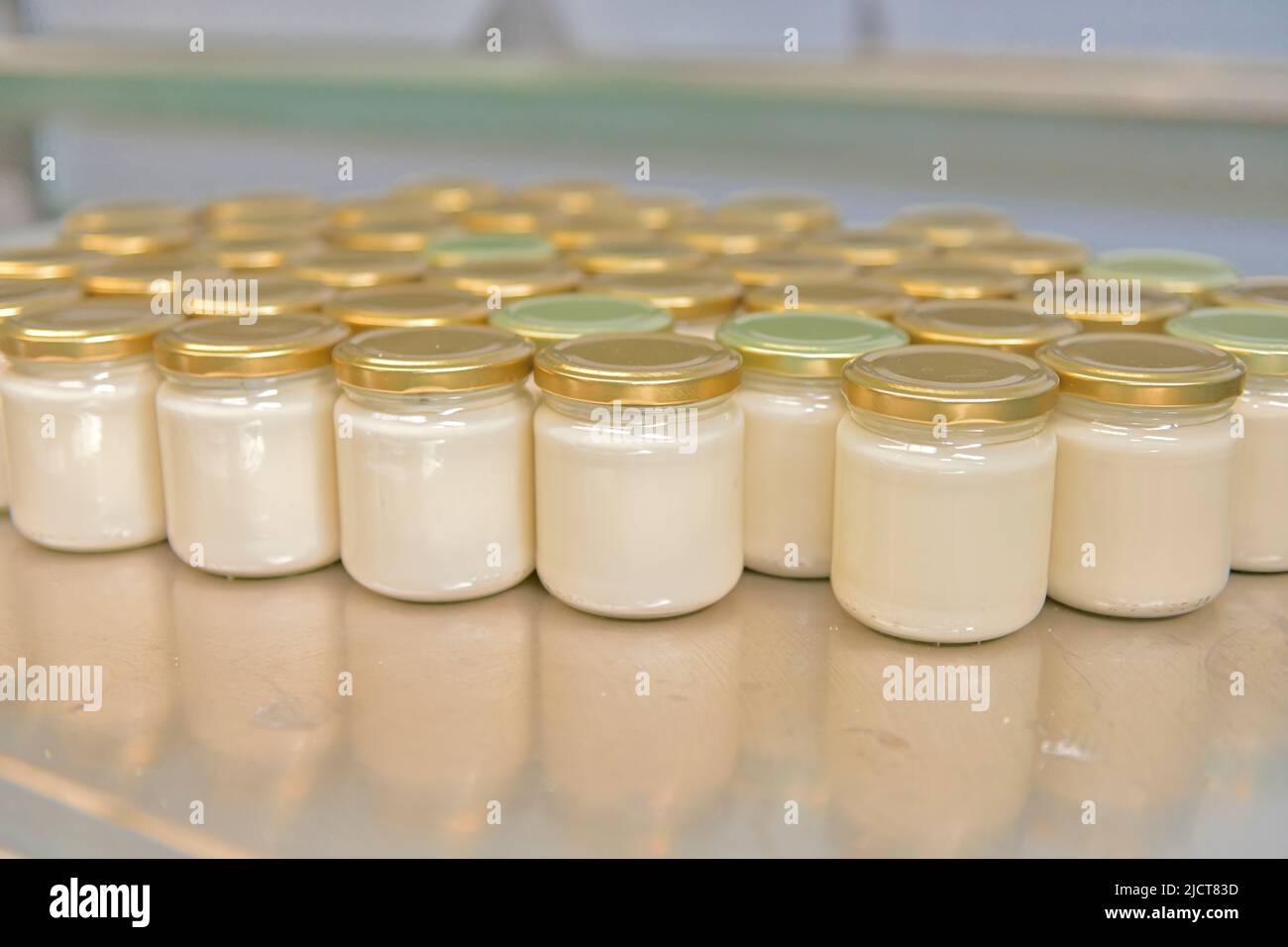 Goat cheese cream, in glass jars Stock Photo Alamy