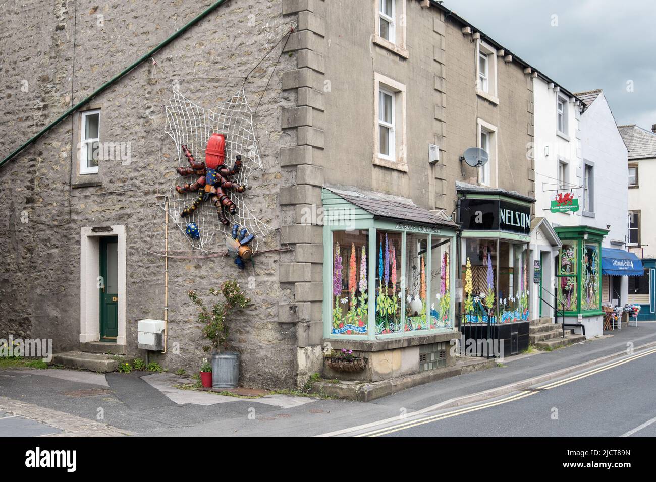 An early entry for this year's (2022) Settle Flowerpot Festival. A spider on a web approaching