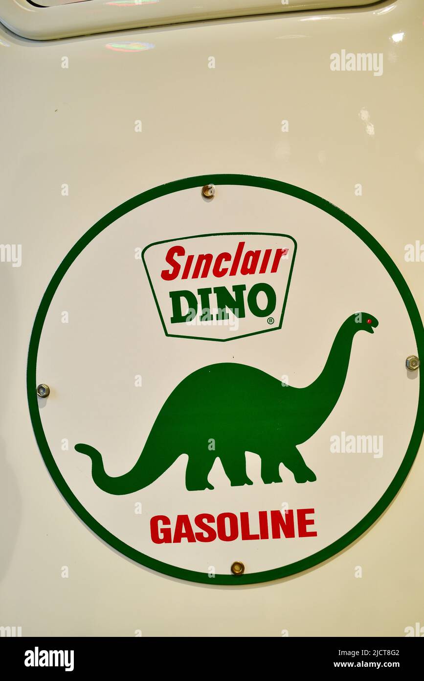 Vintage antique Sinclair Dino Gasoline pump for dispensing gasoline petrol on display at Throttlestop Car & Cycle Museum, Elkhart Lake, Wisconsin, USA Stock Photo
