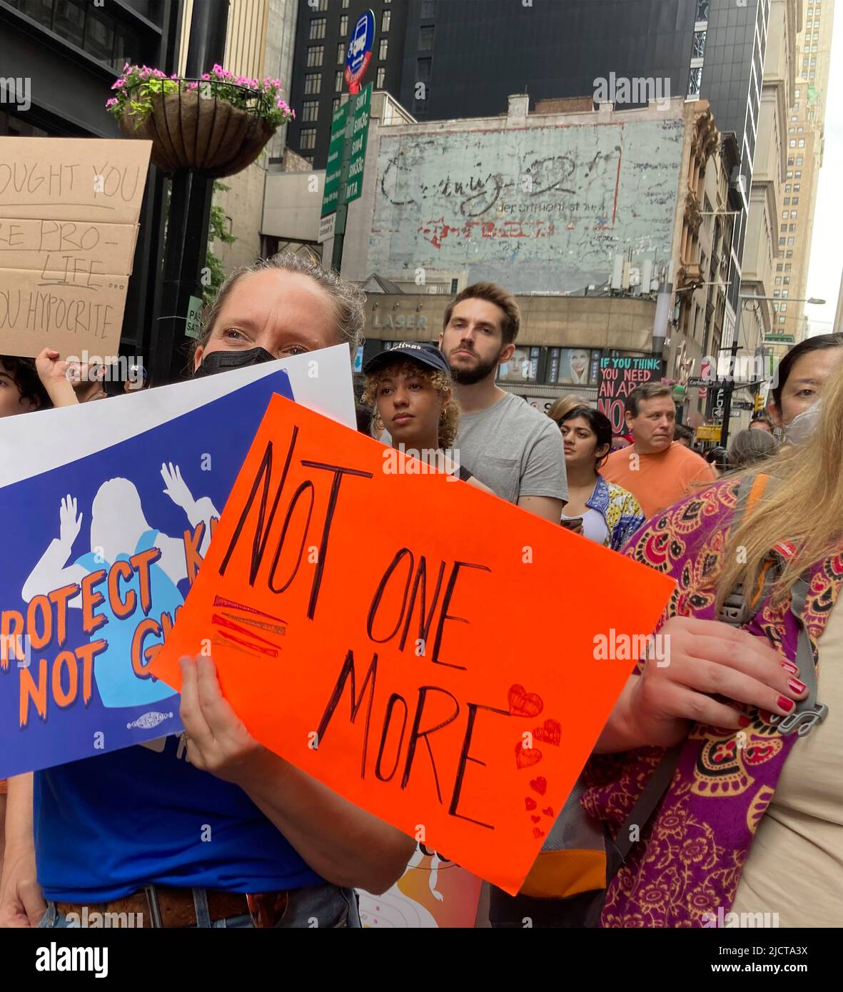 Thousands of protesters in New York in the March For Our Lives on Saturday, June 11, 2022 join the tens of thousands protesting in cities around the country calling for stricter gun control laws in the wake of recent mass shootings. The New York rally marched across the Brooklyn Bridge ending in Lower Manhattan. (© Frances M. Roberts) Stock Photo