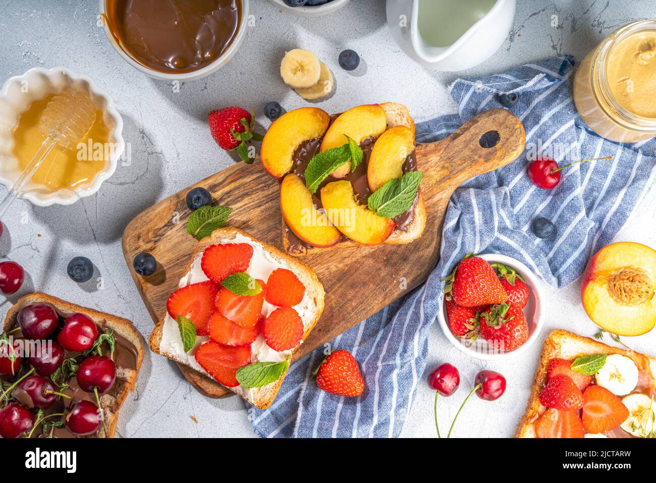 American European summer breakfast sandwiches, toasts with peanut ...