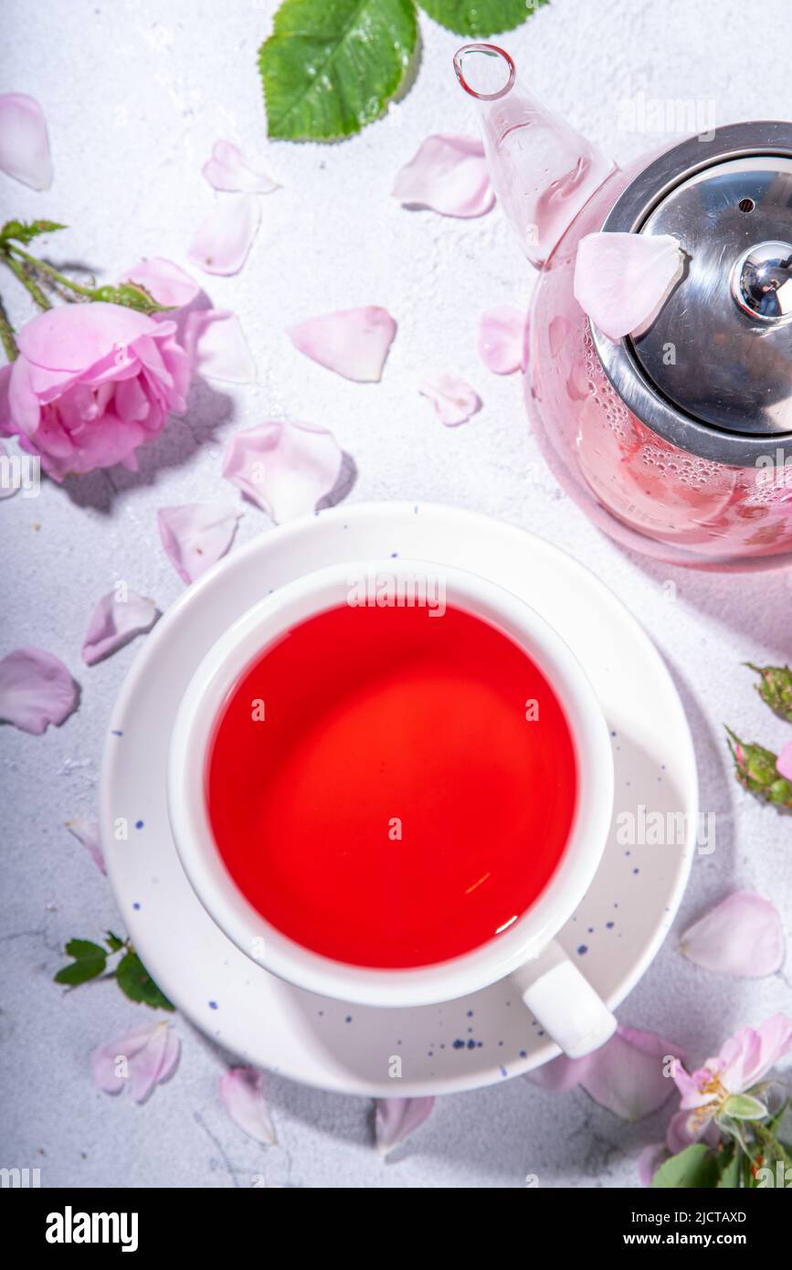 Red Herbal Tea with Edible Flowers. Organic Beverage Stock Photo - Alamy