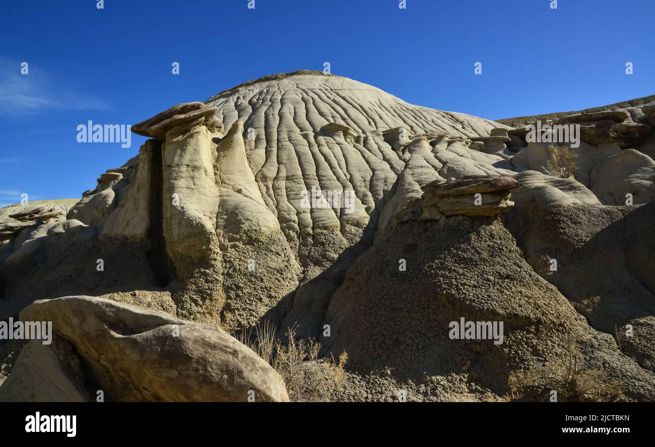 Weird sandstone formations created by erosion at Ah-Shi-Sle-Pah Wilderness Study Area in San Juan County near the city of Farmington, New Mexico. Stock Photo