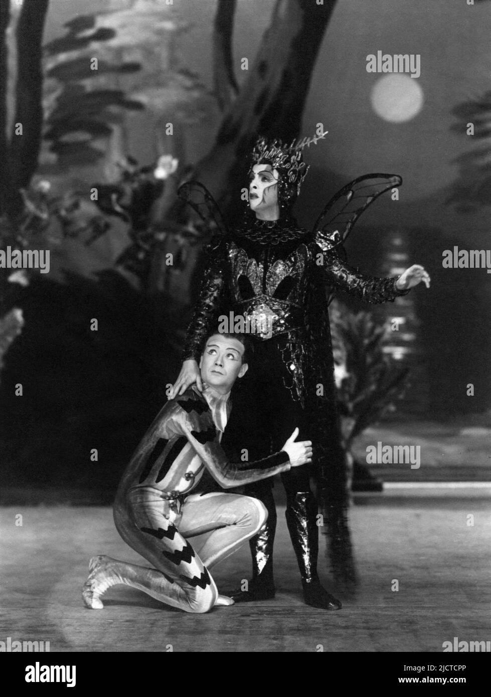 JOHN MILLS and ROBERT HELPMANN as Oberon King of the Fairies in photo by J.W. DEBENHAM in A MIDSUMMER NIGHT'S DREAM 1937 play by William Shakespeare directed by TYRONE GUTHRIE at the Old Vic Theatre in Waterloo, London Stock Photo