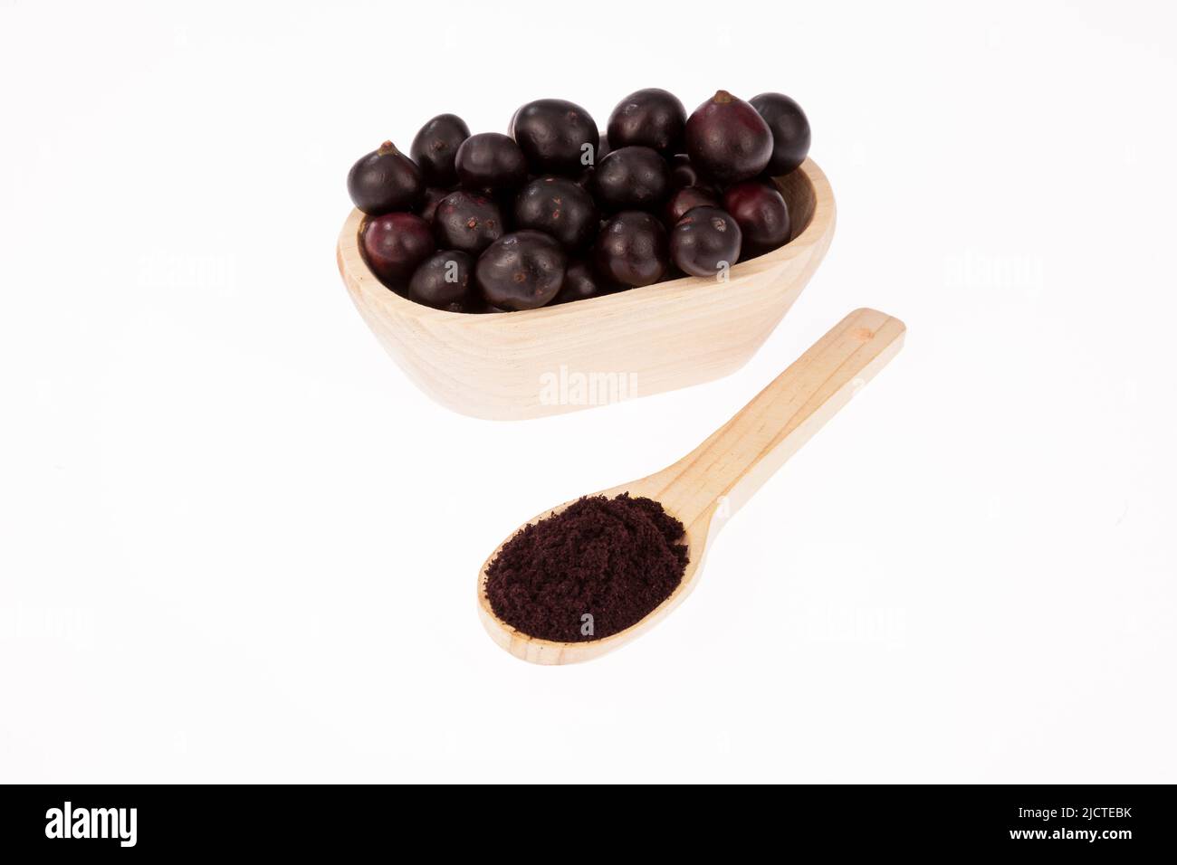 Fruit and acai powder - Euterpe oleracea. Stock Photo