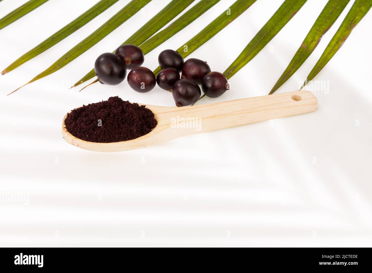Fruit and acai powder - Euterpe oleracea. Stock Photo