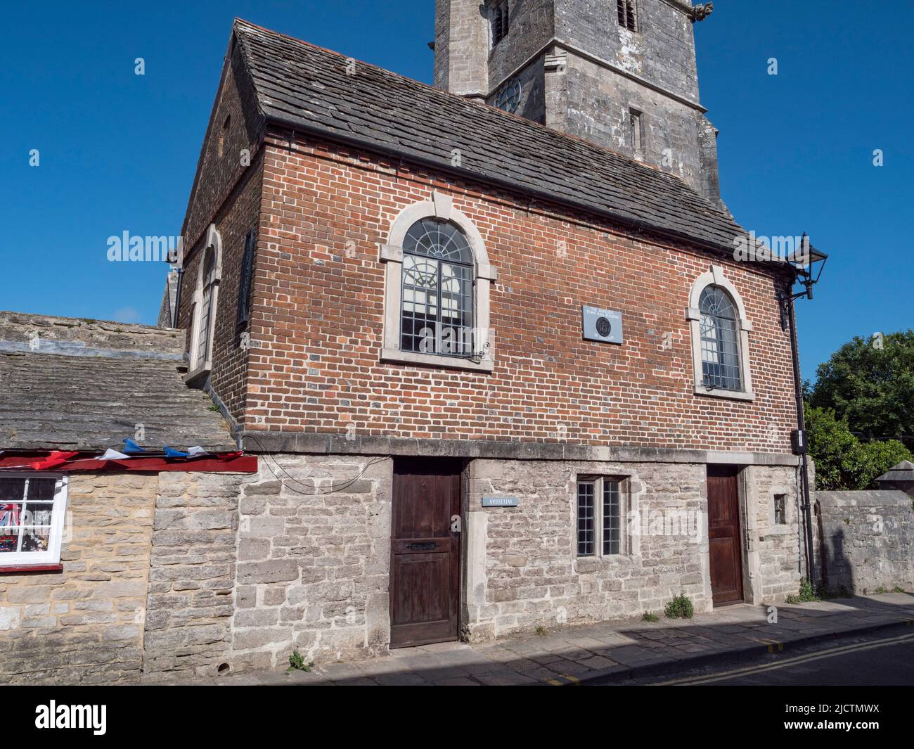 Corfe Castle Town Hall (the smallest town hall building in England) , Wareham in Corfe Castle, Dorset, UK. Stock Photo
