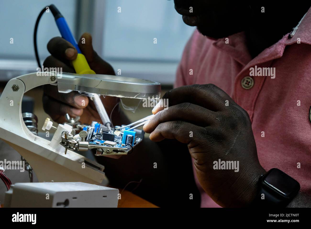 Kampala, Uganda. 31st May, 2022. A hardware developer works inside the