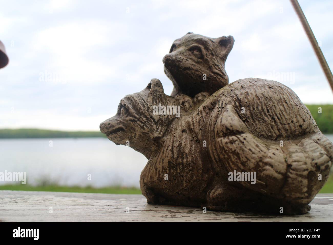 Twin Foxes wooden statues Stock Photo