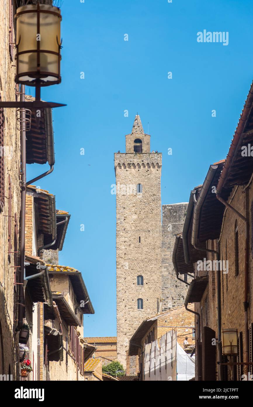 Ancient medieval tower in the town center of San Gimignano, Tuscany ...