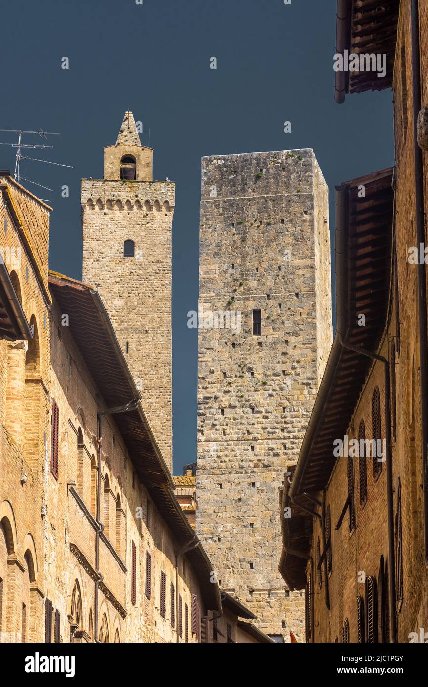 Ancient medieval tower in the town center of San Gimignano, Tuscany ...