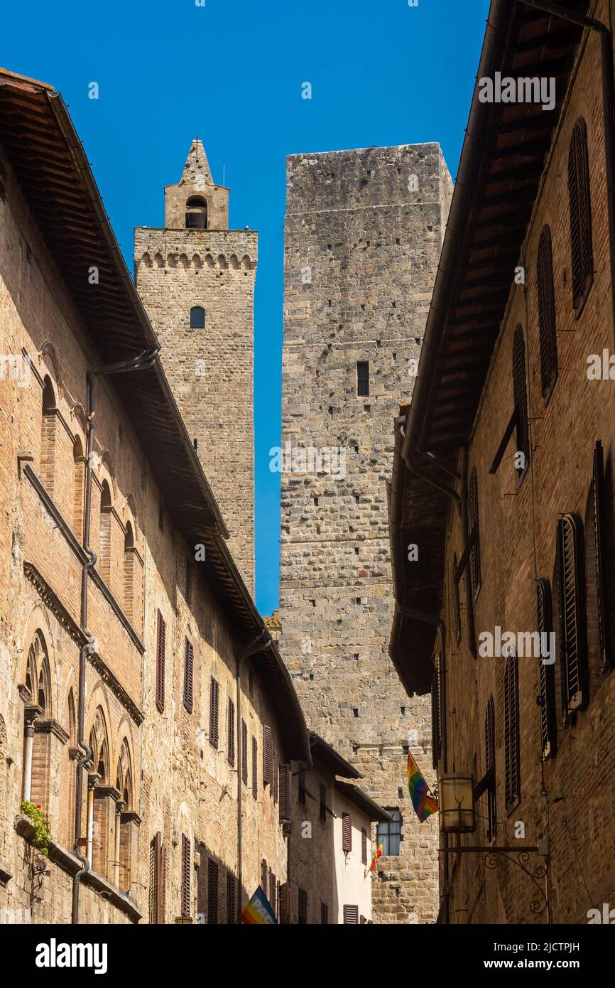 Ancient medieval tower in the town center of San Gimignano, Tuscany ...