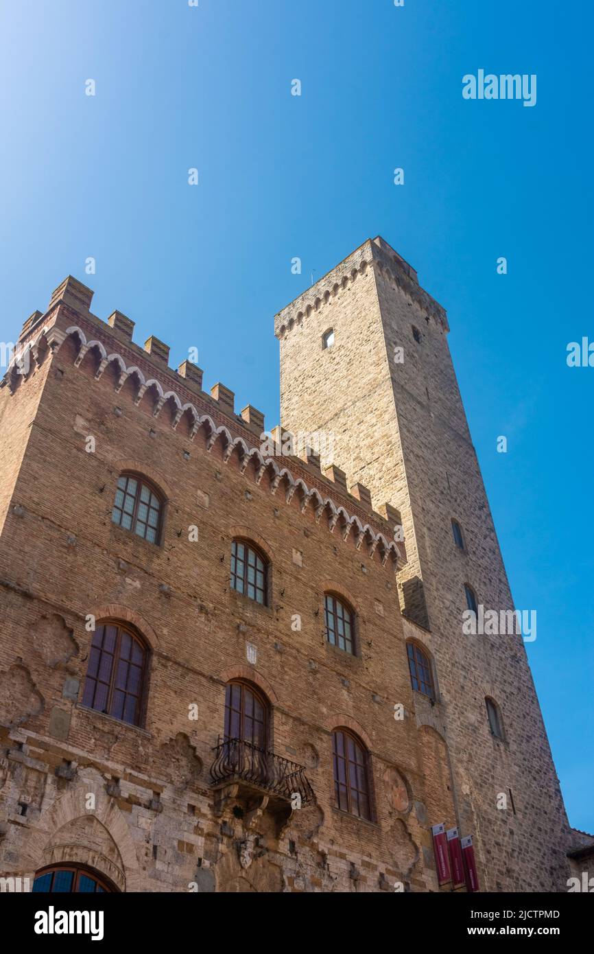 Ancient medieval tower in the town center of San Gimignano, Tuscany ...