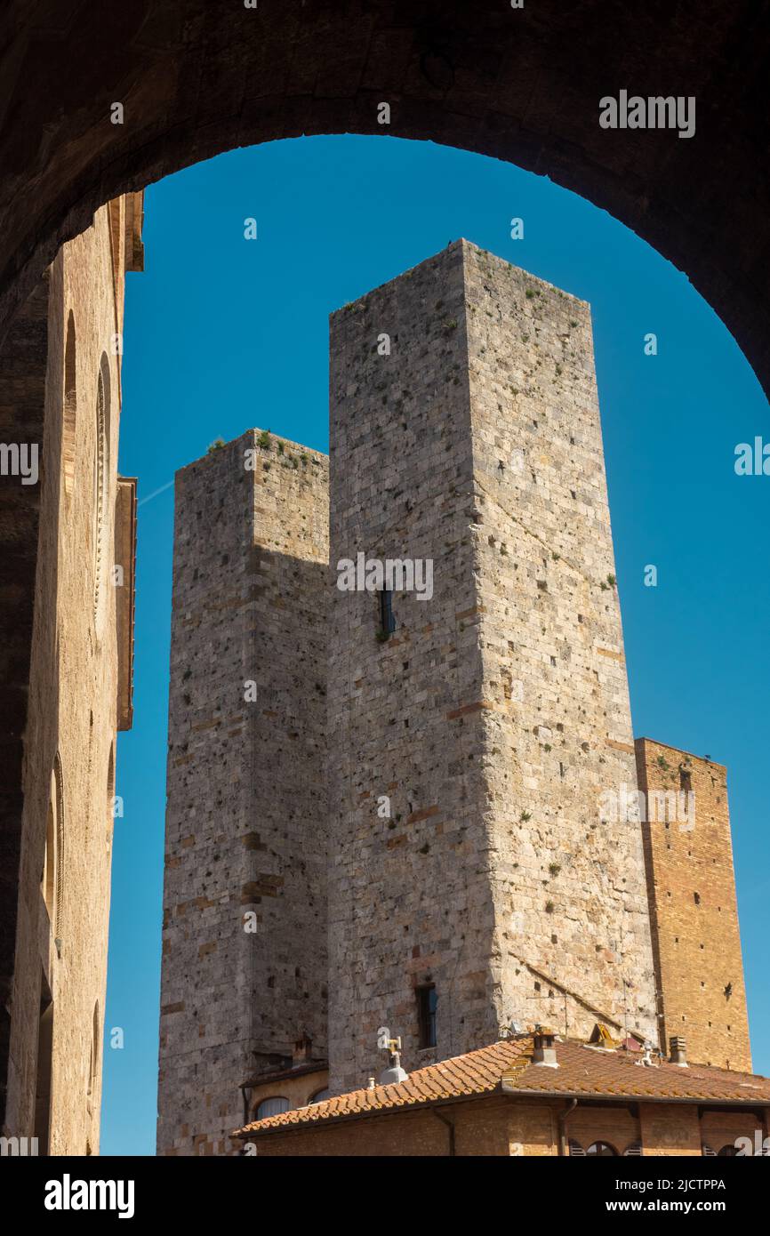 Ancient medieval tower in the town center of San Gimignano, Tuscany ...