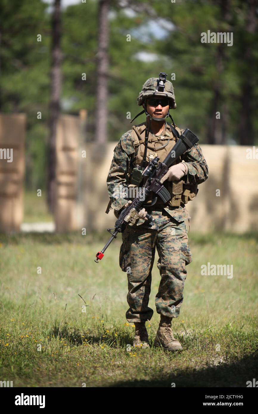 A U.S. Marine with Charlie Company, 1st Battalion, 8th Marine Regiment ...