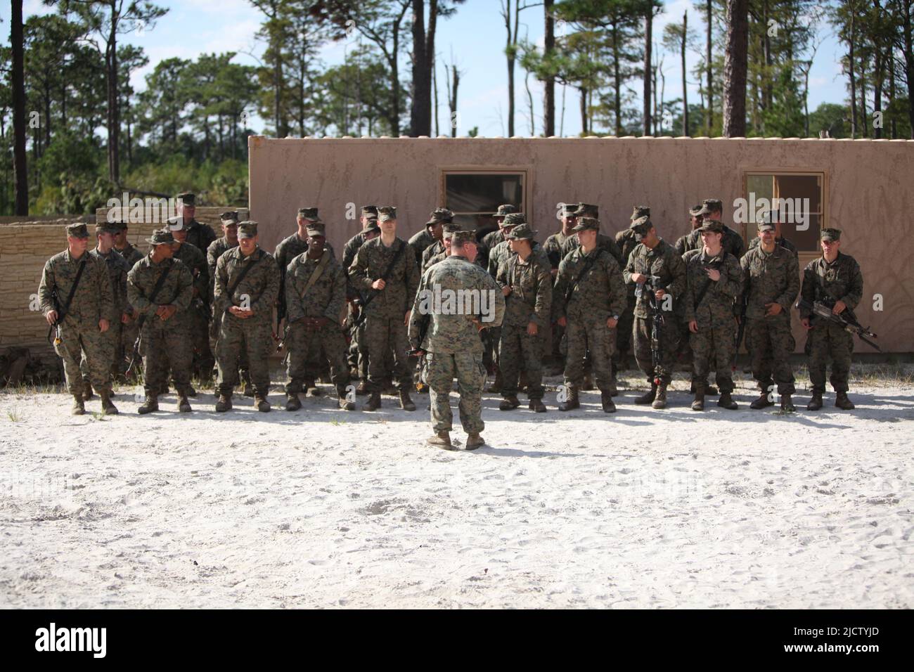 U.S. Marines with 3rd Platoon, Charlie Company, 1st Battalion, 8th Marine Regiment (1/8), 2D Marine Division, stand in formation just after a promotio Stock Photo