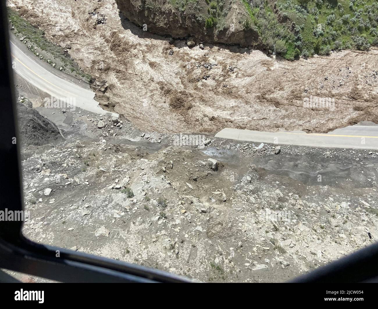 Yellowstone, United States. 13th June, 2022. The north entrance road from Gardiner to Mammoth is washed out after record rains and snow melt caused destructive floods closing Yellowstone National Park at the start of the high season, June 13, 2022 in Yellowstone, Montana. Credit: Doug Kraus/NPS Photo/Alamy Live News Stock Photo