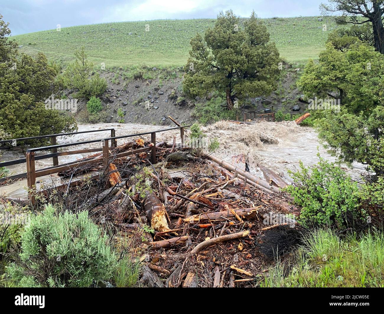 Yellowstone, United States. 13th June, 2022. Raging high water washes out a bridge at Rescue Creek after record rains and snow melt caused destructive floods closing Yellowstone National Park at the start of the high season, June 13, 2022 in Yellowstone, Montana. Credit: Jacob W. Frank/NPS Photo/Alamy Live News Stock Photo