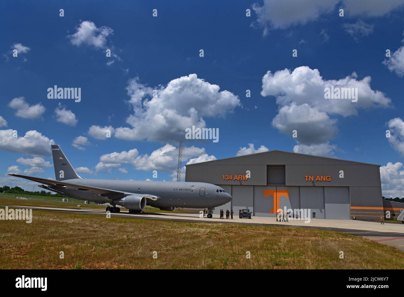 A KC-46A Pegasus, the new next generation refueling aircraft sits in front of the new aircraft hangar at McGhee Tyson ANG Base after the grand opening of the new $31 million facility on Jun. 3.  The KC-46, from the 157th Air Refueling Wing, New Hampshire, was parked in the hangar on display during the event. Stock Photo