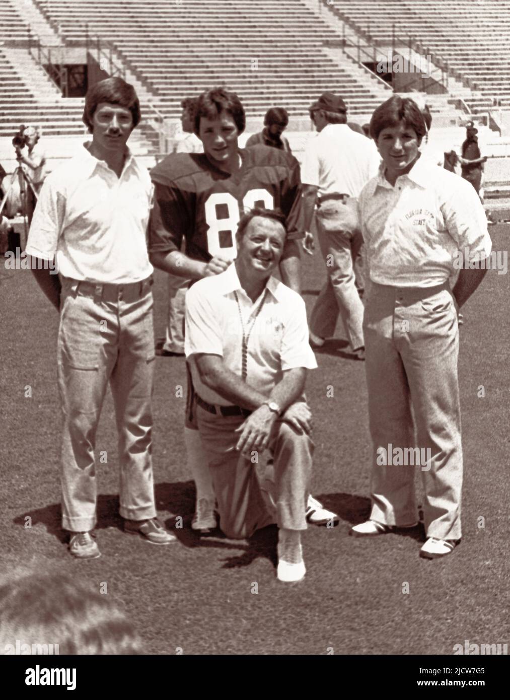 FSU head football coach Bobby Bowden and sons (L-R) Tommy, Jeff, and Terry at Florida State University's Doak Campbell Stadium in 1982. (USA) Stock Photo