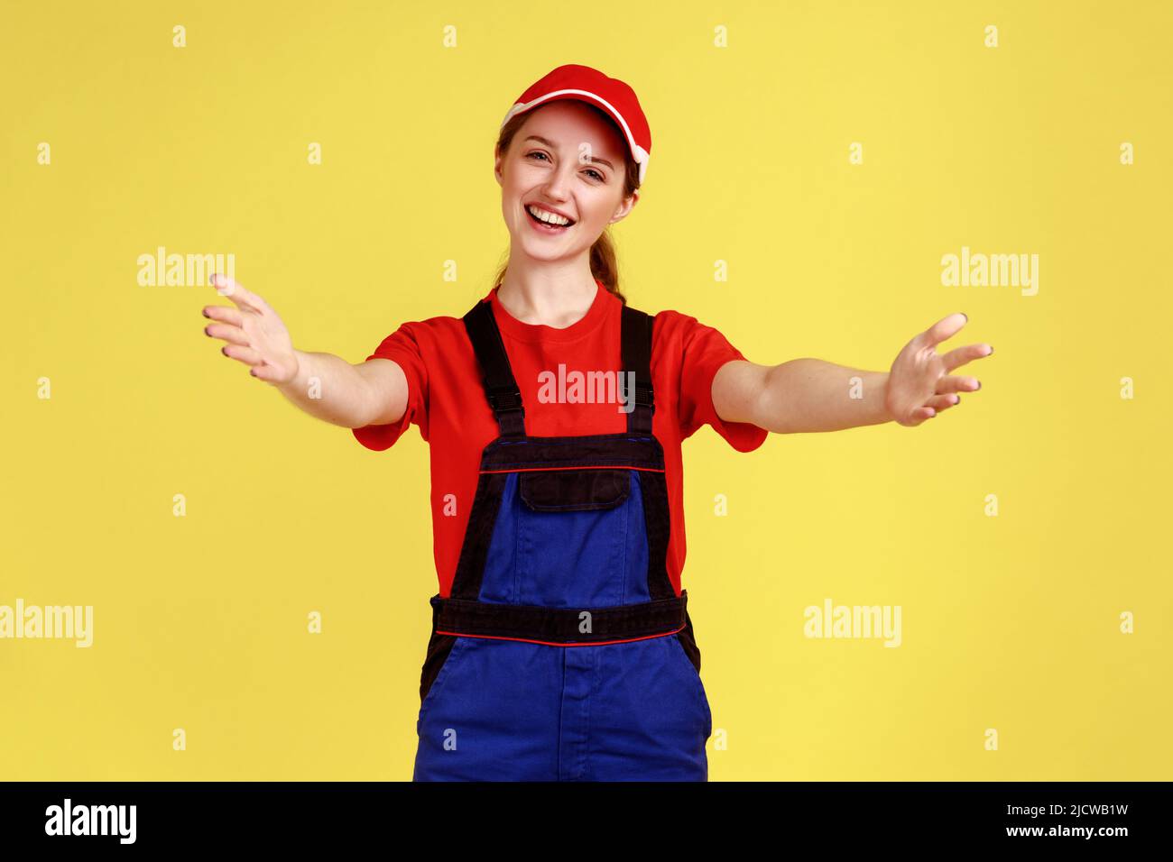 Woman standing arms open wide hi-res stock photography and images - Alamy