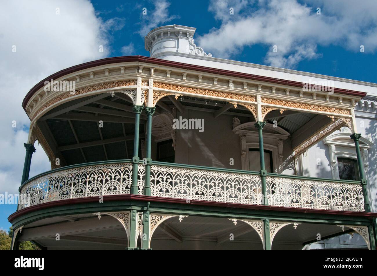 Wrought iron lacework balconies distinguish a colonial-era commercial building in the historic Victorian Goldfields city of Bendigo, Australia Stock Photo